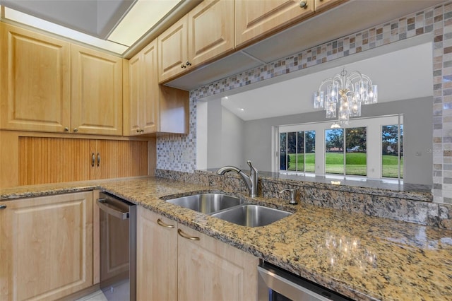 4044 Penshurst Park, Sarasota, FL 34235 - kitchen with light brown cabinetry, stainless steel dishwasher, and a sink