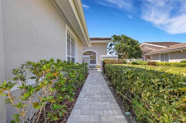 4044 Penshurst Park, Sarasota, FL 34235 - property entrance with stucco siding