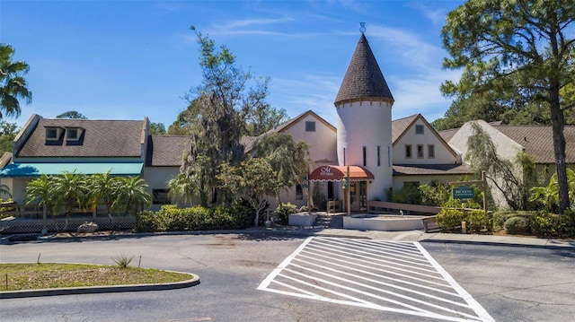 4044 Penshurst Park, Sarasota, FL 34235 - view of property featuring uncovered parking