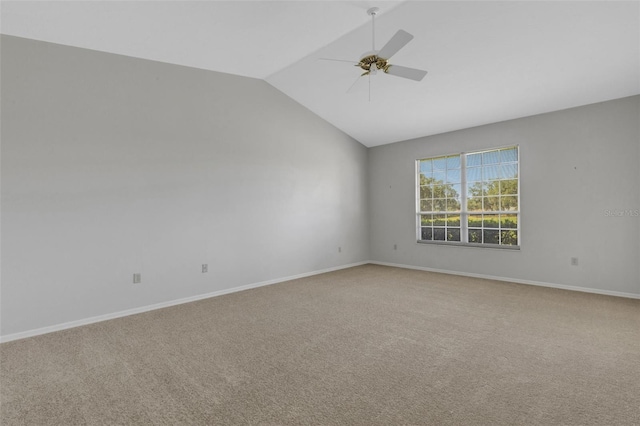 4044 Penshurst Park, Sarasota, FL 34235 - unfurnished room with light carpet, baseboards, vaulted ceiling, and a ceiling fan