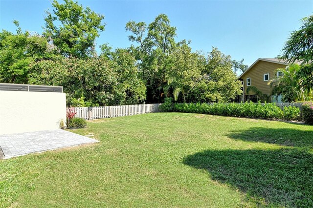 view of yard with fence