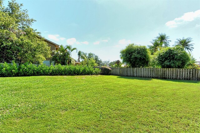 view of yard with fence