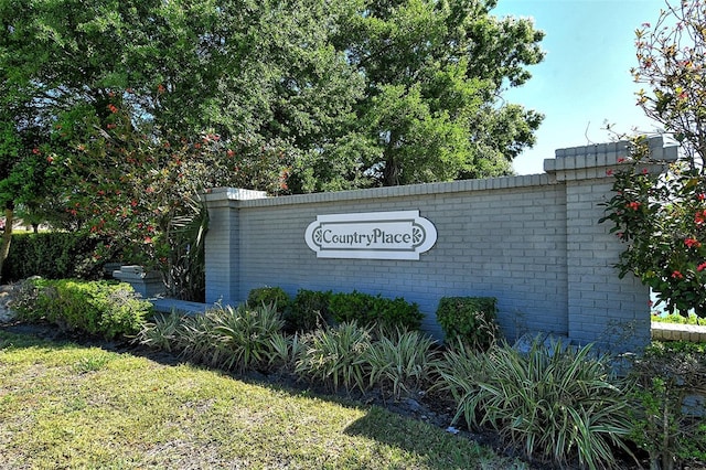 view of community sign