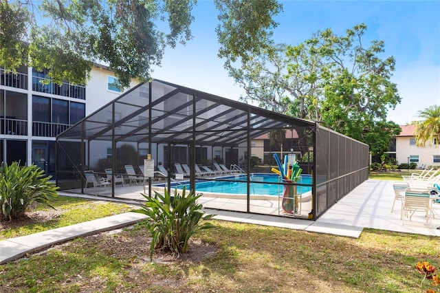 2300 Stickney Point Rd Unit 125, Sarasota, FL 34231 - outdoor pool featuring a patio and a lanai