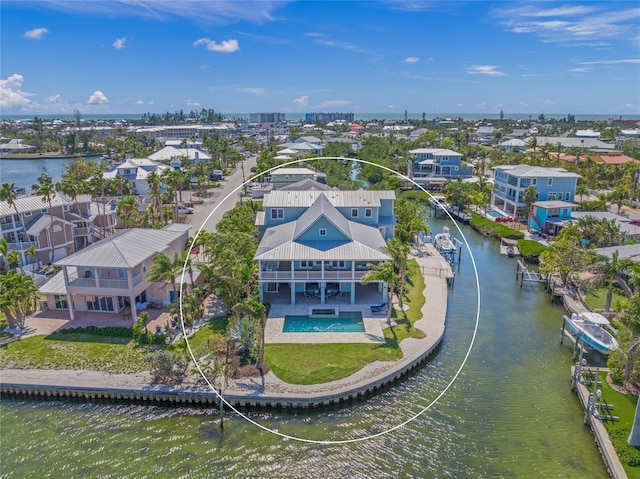 526 56th St, Holmes Beach, FL 34217 - drone / aerial view featuring a water view and a residential view