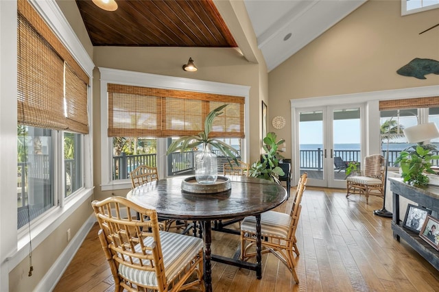 526 56th St, Holmes Beach, FL 34217 - sunroom with french doors, plenty of natural light, and beam ceiling