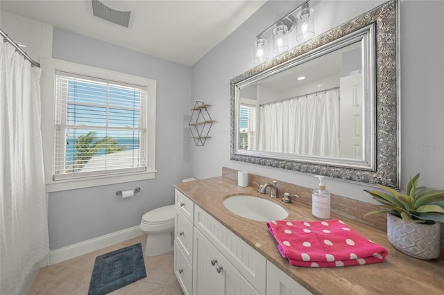 526 56th St, Holmes Beach, FL 34217 - full bathroom with visible vents, baseboards, toilet, vanity, and tile patterned flooring