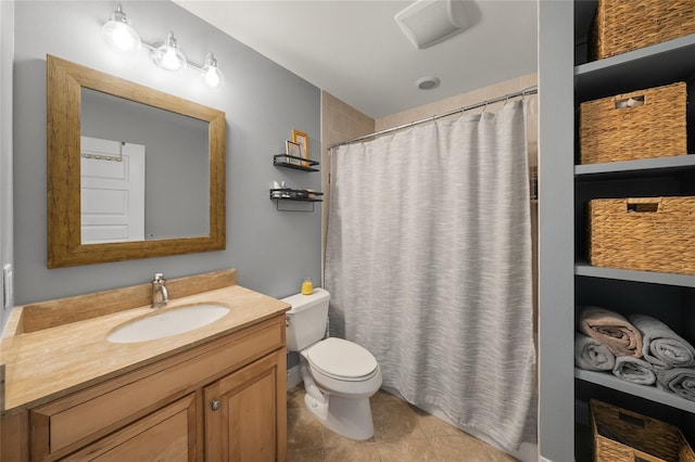 526 56th St, Holmes Beach, FL 34217 - bathroom with toilet, vanity, tile patterned flooring, and a shower with curtain