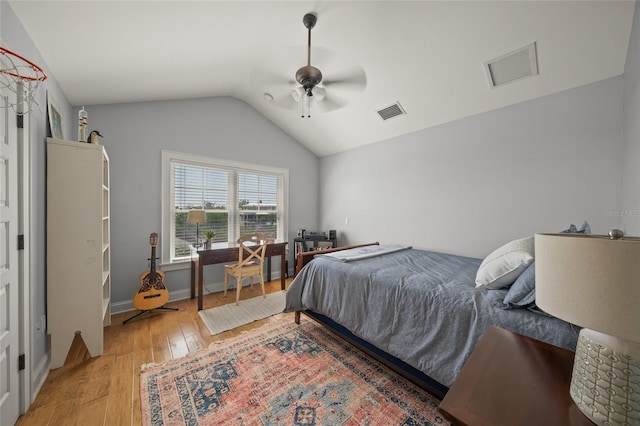 526 56th St, Holmes Beach, FL 34217 - bedroom featuring visible vents, ceiling fan, light wood-type flooring, and lofted ceiling