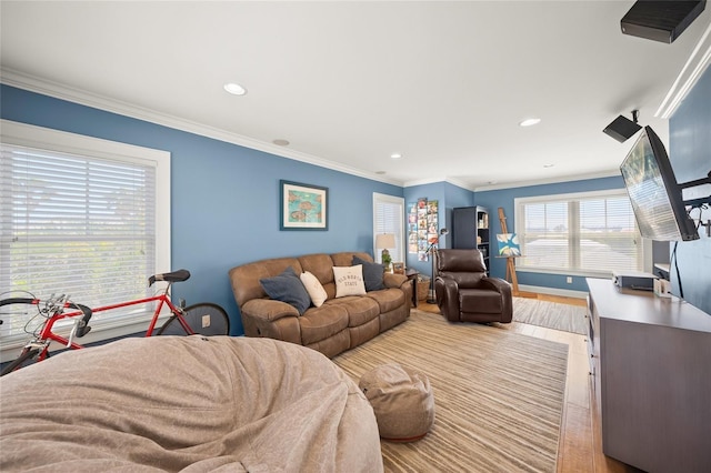 526 56th St, Holmes Beach, FL 34217 - living area featuring crown molding, wood finished floors, baseboards, and recessed lighting