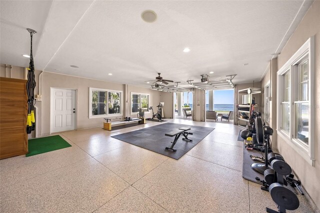 526 56th St, Holmes Beach, FL 34217 - workout room featuring recessed lighting, plenty of natural light, baseboards, and ceiling fan