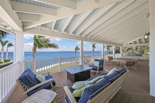 526 56th St, Holmes Beach, FL 34217 - wooden deck with an outdoor hangout area and a water view