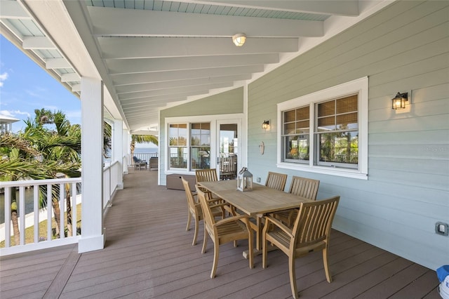 526 56th St, Holmes Beach, FL 34217 - wooden deck with outdoor dining space