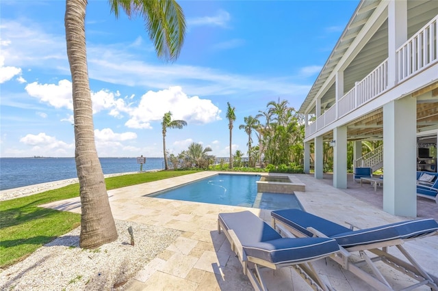 526 56th St, Holmes Beach, FL 34217 - view of pool with a patio, a pool with connected hot tub, and a water view