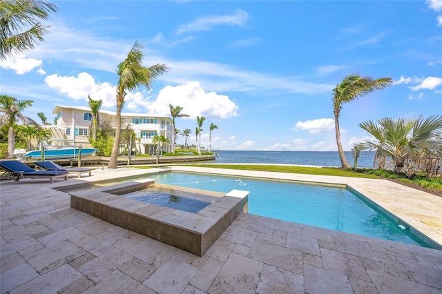 526 56th St, Holmes Beach, FL 34217 - outdoor pool with a water view, an in ground hot tub, and a patio