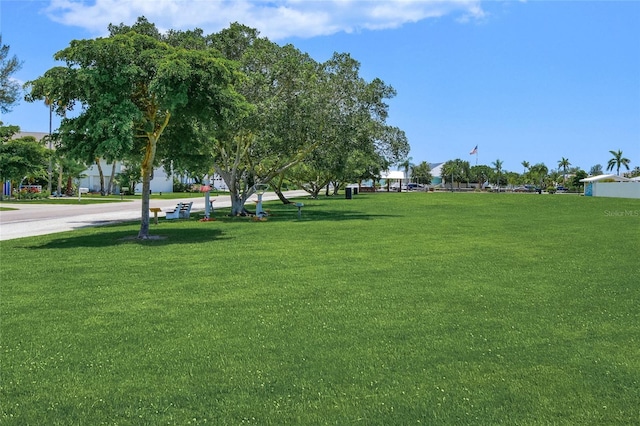 526 56th St, Holmes Beach, FL 34217 - view of property's community featuring a yard