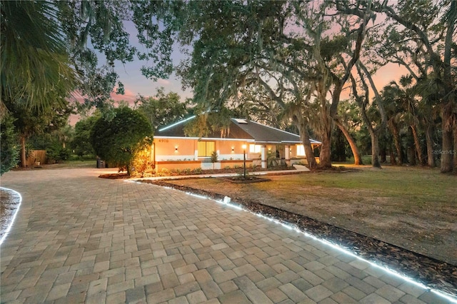 4916 Hidden Oaks Trl, Sarasota, FL 34232 - view of front of house featuring driveway