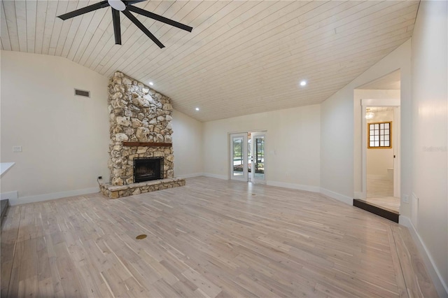4916 Hidden Oaks Trl, Sarasota, FL 34232 - unfurnished living room with light wood-style floors, a ceiling fan, a fireplace, high vaulted ceiling, and baseboards