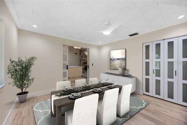 4916 Hidden Oaks Trl, Sarasota, FL 34232 - dining room with baseboards, light wood-type flooring, and recessed lighting