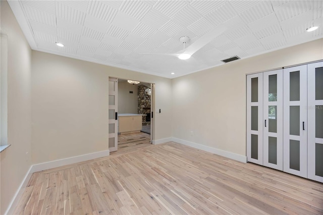 4916 Hidden Oaks Trl, Sarasota, FL 34232 - unfurnished room with light wood-style floors, baseboards, and recessed lighting
