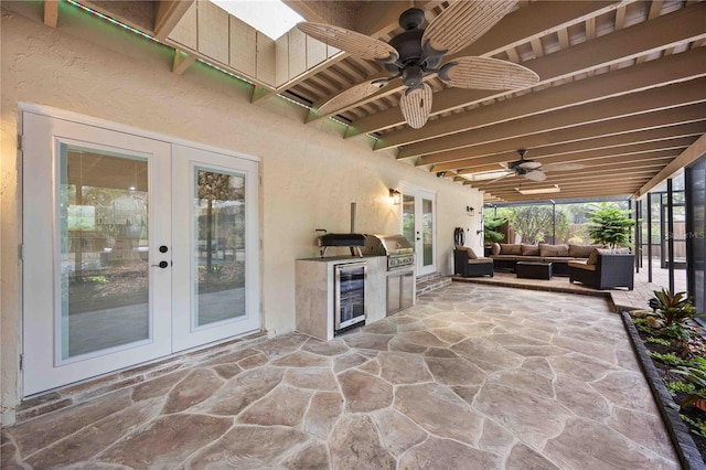4916 Hidden Oaks Trl, Sarasota, FL 34232 - view of patio with french doors, an outdoor hangout area, area for grilling, ceiling fan, and beverage cooler