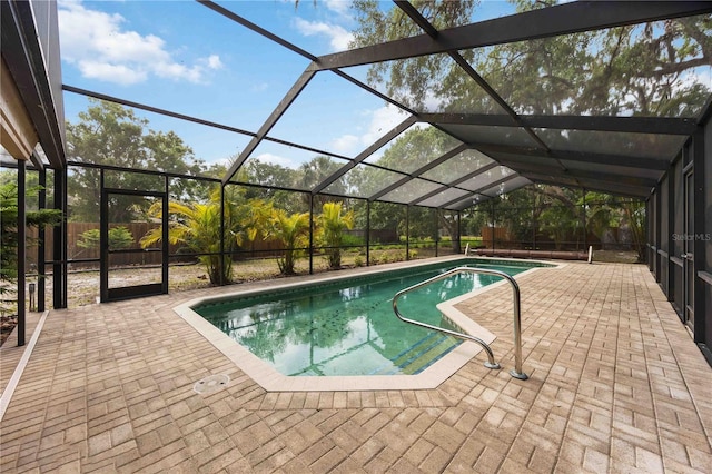 4916 Hidden Oaks Trl, Sarasota, FL 34232 - outdoor pool with a patio and glass enclosure