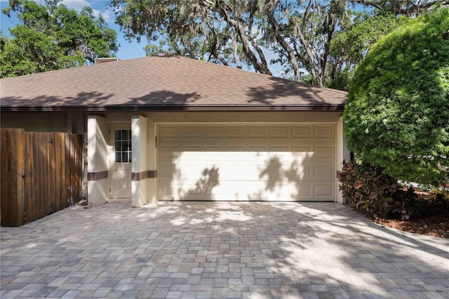 4916 Hidden Oaks Trl, Sarasota, FL 34232 - garage featuring driveway