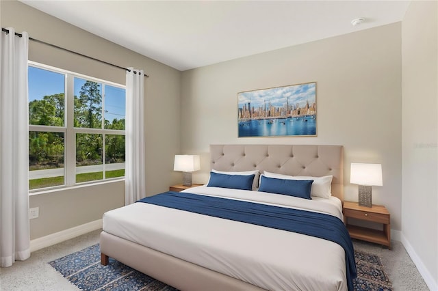 bedroom featuring baseboards