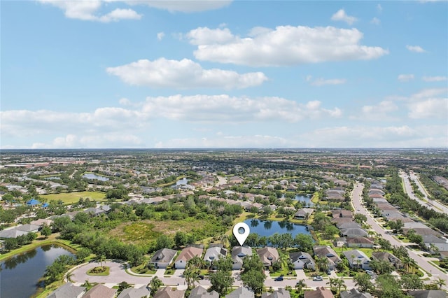 5023 Brickell Park Cv, Bradenton, FL 34211 - aerial view of property and surrounding area with nearby suburban area and a large body of water