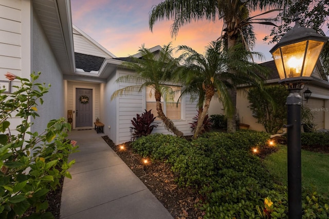 5023 Brickell Park Cv, Bradenton, FL 34211 - view of exterior entry featuring stucco siding