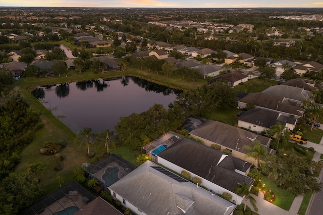 5023 Brickell Park Cv, Bradenton, FL 34211 - aerial view at dusk of a water view and a residential view