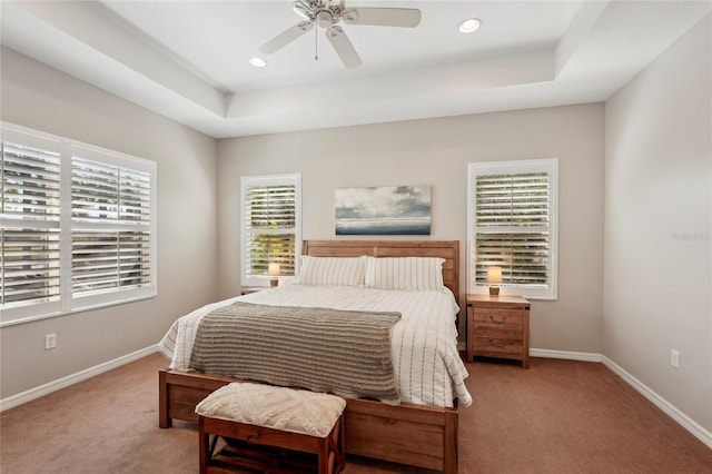 5023 Brickell Park Cv, Bradenton, FL 34211 - bedroom with light carpet, baseboards, a tray ceiling, and recessed lighting
