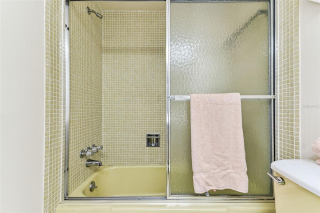 7461 W Country Club Dr N Unit 408, Sarasota, FL 34243 - bathroom with combined bath / shower with glass door and toilet