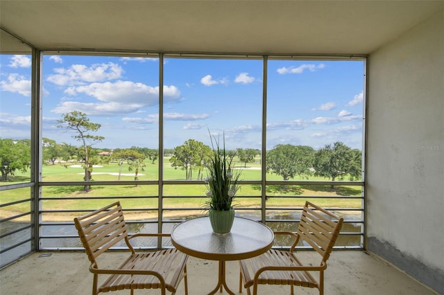 7461 W Country Club Dr N Unit 408, Sarasota, FL 34243 - sunroom / solarium featuring golf course view