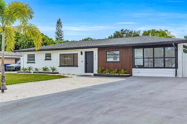 1921 Fern Ave, Sarasota, FL 34235 - single story home with driveway and roof with shingles