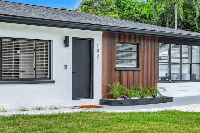 1921 Fern Ave, Sarasota, FL 34235 - property entrance featuring roof with shingles