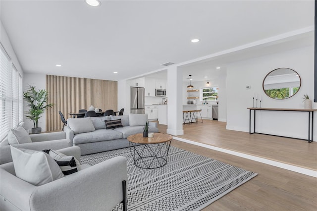 1921 Fern Ave, Sarasota, FL 34235 - living area featuring baseboards, recessed lighting, light wood finished floors, and visible vents
