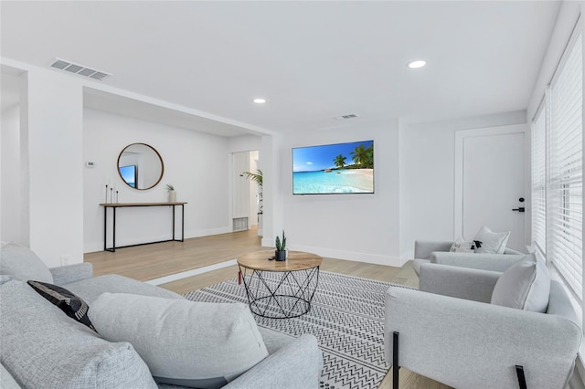 1921 Fern Ave, Sarasota, FL 34235 - living room featuring recessed lighting, visible vents, and light wood-style floors