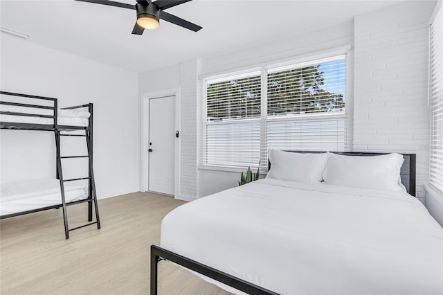 1921 Fern Ave, Sarasota, FL 34235 - bedroom with ceiling fan, light wood-style flooring, and visible vents