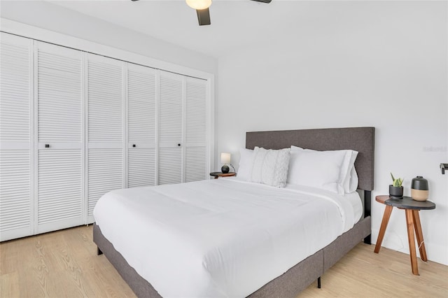 1921 Fern Ave, Sarasota, FL 34235 - bedroom featuring light wood finished floors, a closet, and a ceiling fan