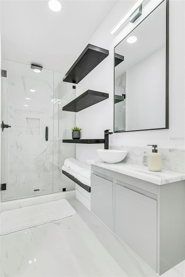 1921 Fern Ave, Sarasota, FL 34235 - full bathroom with a marble finish shower, marble finish floor, vanity, and recessed lighting