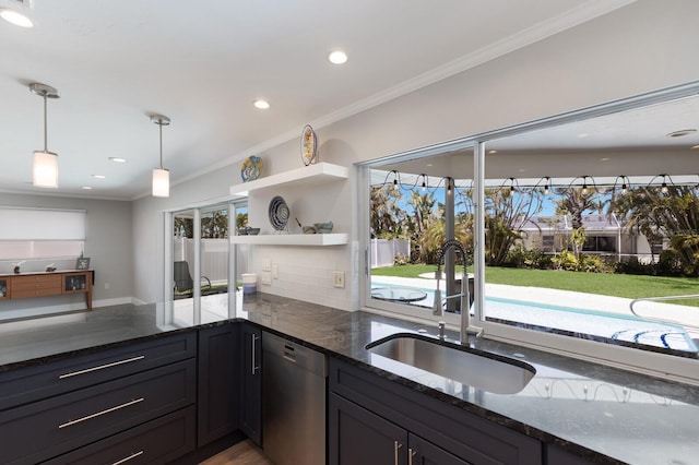 508 70th St, Holmes Beach, FL 34217 - kitchen with dishwasher, a sink, dark stone counters, and crown molding