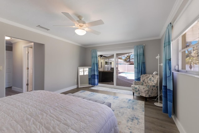 508 70th St, Holmes Beach, FL 34217 - bedroom with access to outside, ornamental molding, visible vents, wood finished floors, and baseboards