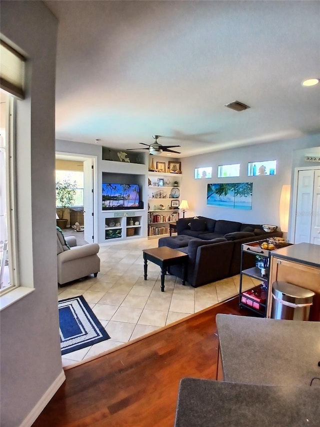 6631 63rd Ter E, Bradenton, FL 34203 - living area with ceiling fan, wood finished floors, and recessed lighting