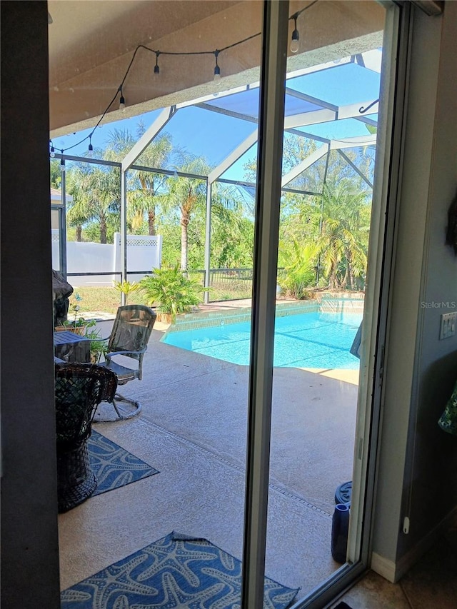 6631 63rd Ter E, Bradenton, FL 34203 - outdoor pool featuring glass enclosure and a patio