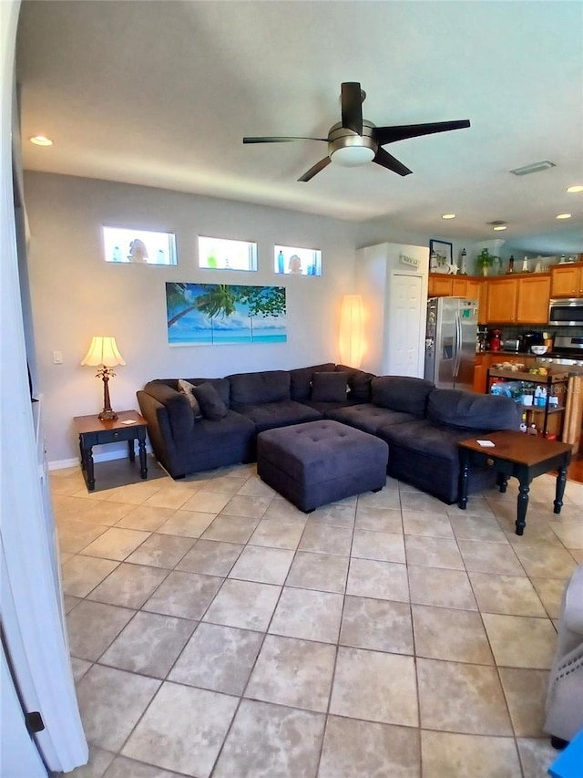 6631 63rd Ter E, Bradenton, FL 34203 - living room featuring light tile patterned floors, ceiling fan, and recessed lighting