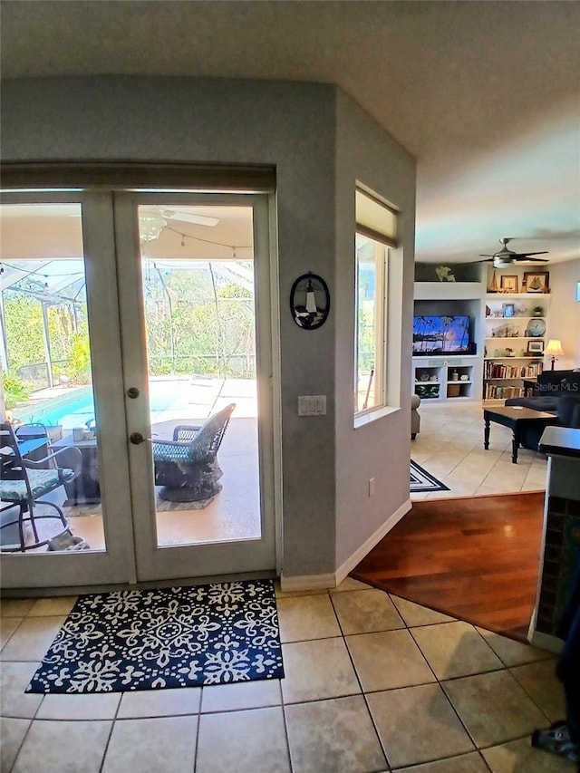 6631 63rd Ter E, Bradenton, FL 34203 - tiled entrance foyer with a ceiling fan and baseboards