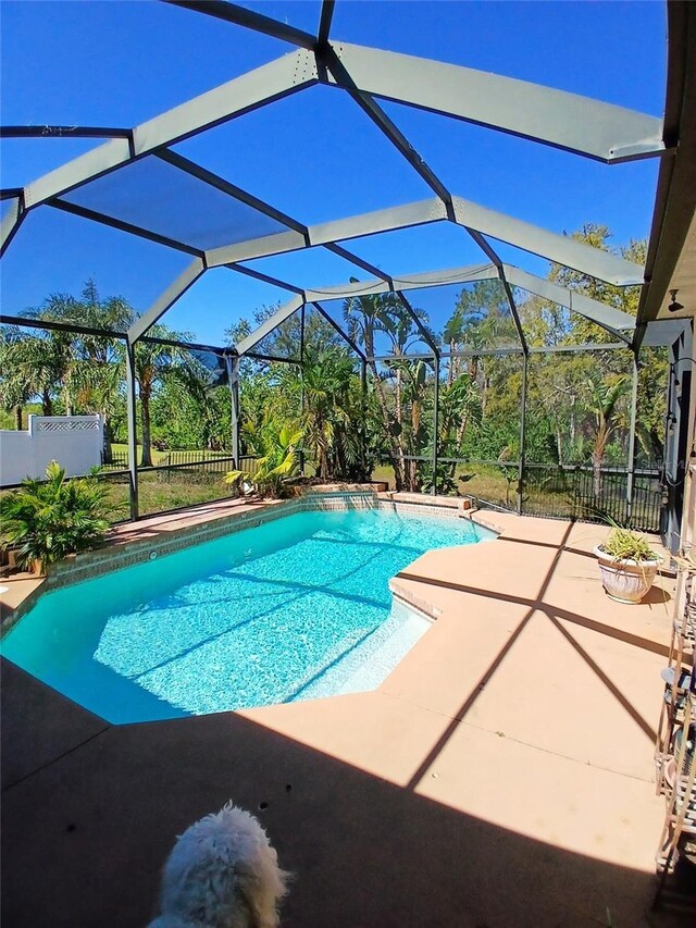 6631 63rd Ter E, Bradenton, FL 34203 - swimming pool featuring a patio area, a lanai, and fence