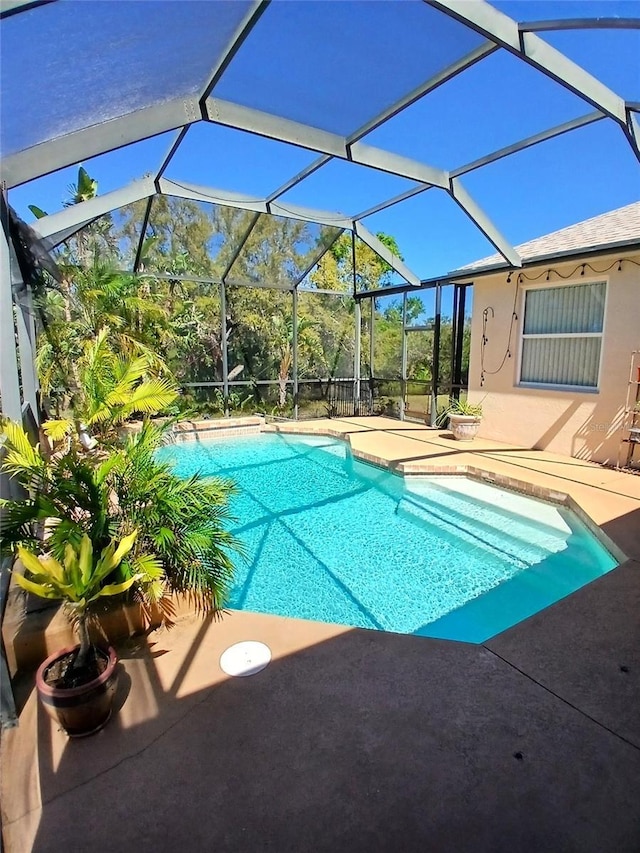 6631 63rd Ter E, Bradenton, FL 34203 - outdoor pool featuring a patio area