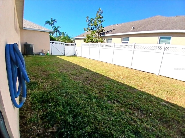 6631 63rd Ter E, Bradenton, FL 34203 - view of yard with a gate and cooling unit